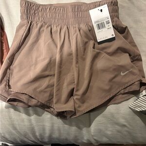 Nike Women's Athletic Shorts in Tan